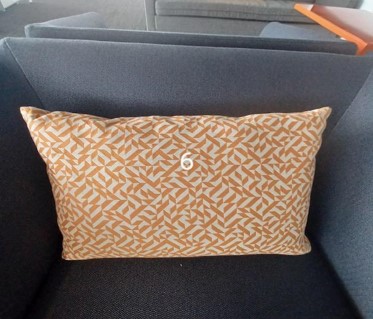 Pillow, orange/white pattern