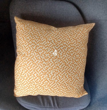 Pillow, orange/white pattern